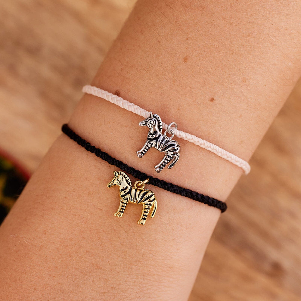 Bracelet Pura Vida en forme de zèbre doré, noir.
