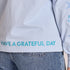 Life is Good W LS Crusher Grateful Day Message Tee GLACIER BLUE